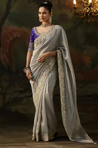 grey faux tissue saree with contrast embroidered blouse