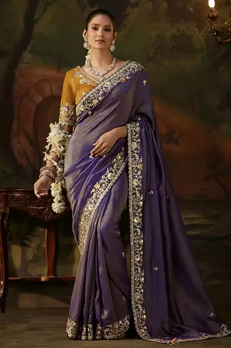 violet faux tissue saree with contrast embroidered blouse