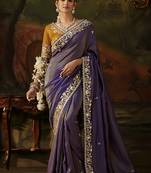 violet faux tissue saree with contrast embroidered blouse