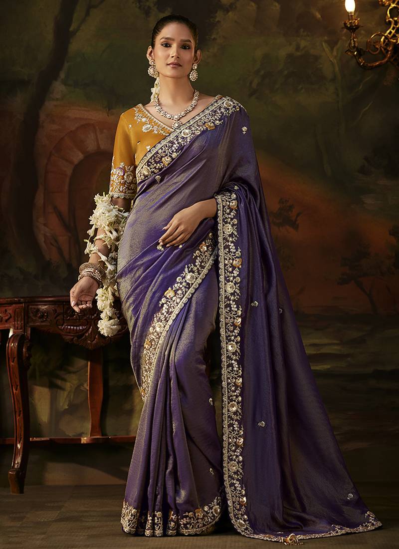 violet faux tissue saree with contrast embroidered blouse