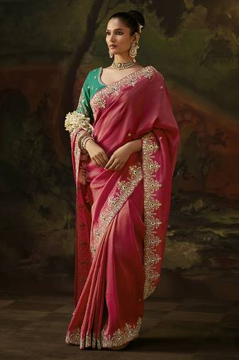 pink faux tissue saree with contrast embroidered blouse