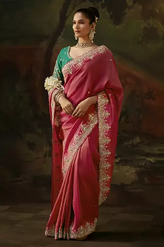 pink faux tissue saree with contrast embroidered blouse