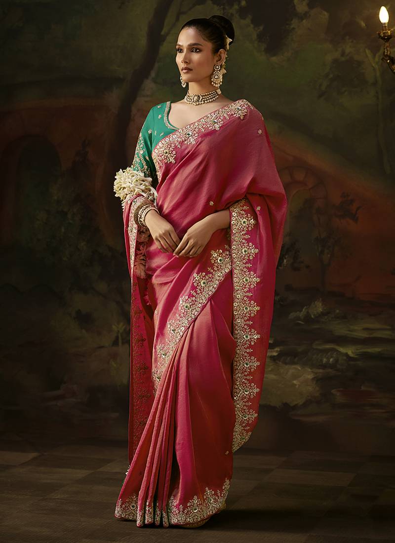 pink faux tissue saree with contrast embroidered blouse