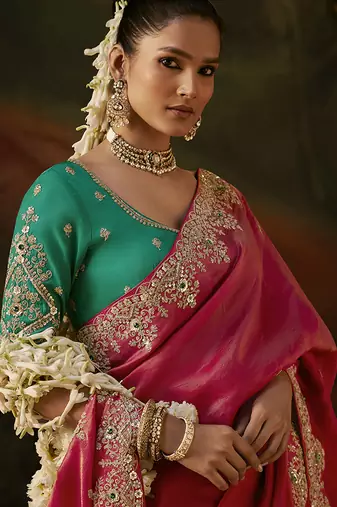 pink faux tissue saree with contrast embroidered blouse