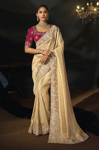 beige silk blend saree with cutdana border & embroidered blouse
