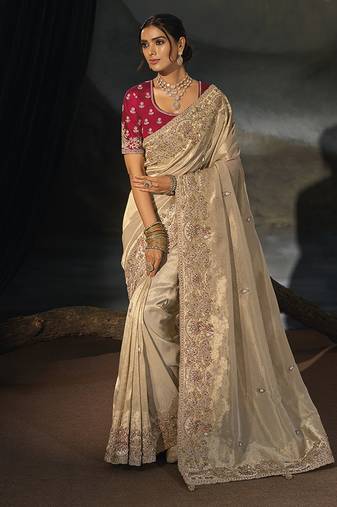 beige silk blend saree with floral zardozi border & magenta blouse