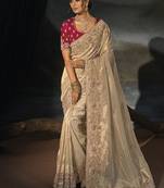 beige silk blend saree with floral zardozi border & magenta blouse