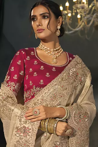 beige silk blend saree with floral zardozi border & magenta blouse