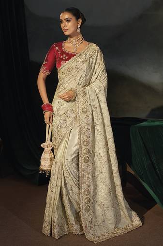 cream silk blend saree with zardozi border & red blouse