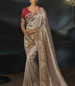 grey silk blend saree with gold border & contrast blouse