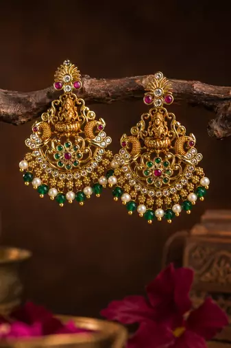 Gold plated lakshmi temple earrings with ruby green stones & pearl beads- green