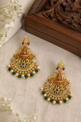 Gold plated lakshmi temple earrings with ruby green stones & pearl beads- green