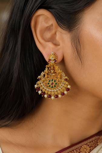 Gold plated lakshmi temple earrings with ruby green stones & pearl beads - red