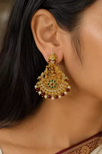 Gold plated lakshmi temple earrings with ruby green stones & pearl beads - red