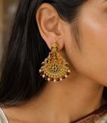 Gold plated lakshmi temple earrings with ruby green stones & pearl beads - red