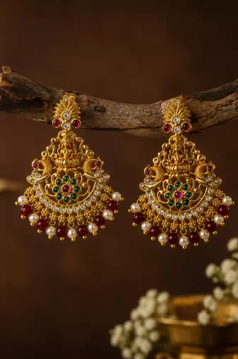 Gold plated lakshmi temple earrings with ruby green stones & pearl beads - red