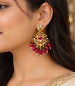 Traditional gold plated kundan chandbali earrings with red beads & green stones