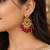 Traditional gold plated kundan chandbali earrings with red beads & green stones
