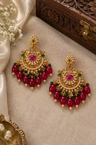 Traditional gold plated kundan chandbali earrings with red beads & green stones