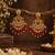 Traditional gold-plated kundan chandbali earrings with red beads & pearls