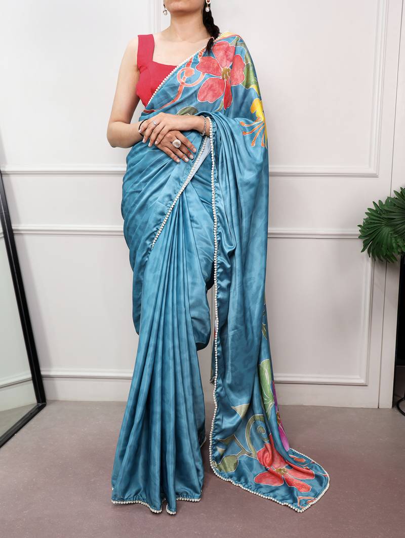 sky blue festive & party wear digital printed satin saree with pearl border