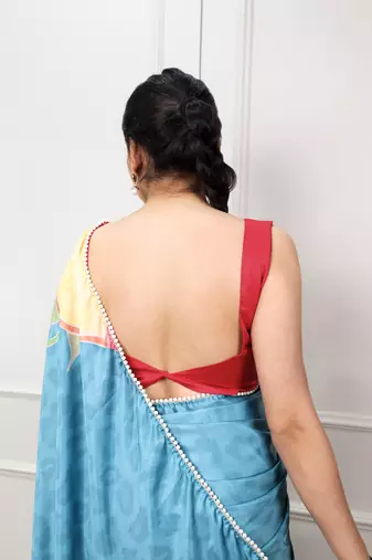 sky blue festive & party wear digital printed satin saree with pearl border