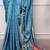 sky blue festive & party wear digital printed satin saree with pearl border