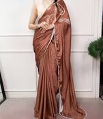 brown festive & party wear digital printed satin saree with pearl border