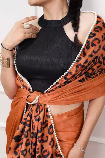 orange festive & party wear digital printed satin saree with pearl border