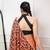 orange festive & party wear digital printed satin saree with pearl border