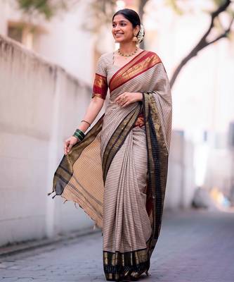 beige traditional silk blend checks saree with contrast zari weaving border & unstitched blouse piece 1