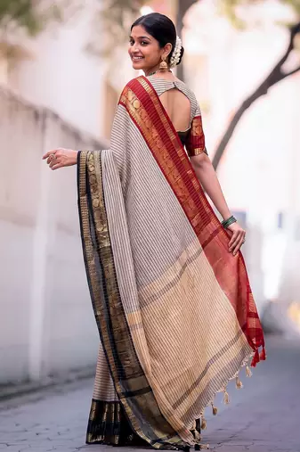 beige traditional silk blend checks saree with contrast zari weaving border & unstitched blouse piece