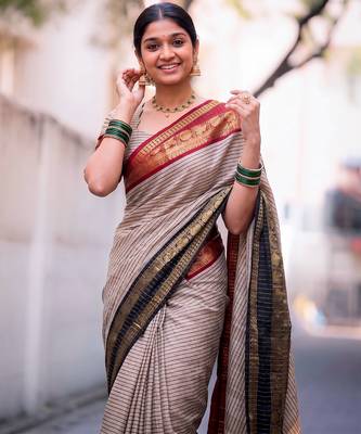 beige traditional silk blend checks saree with contrast zari weaving border & unstitched blouse piece 5