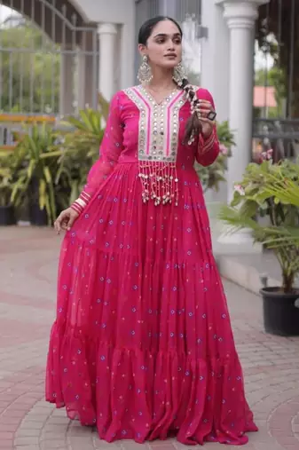 Rani-pink faux georgette printed flared gown set