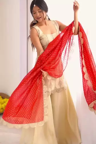 Cream embroidered kurta palazzo set with red bandhani dupatta