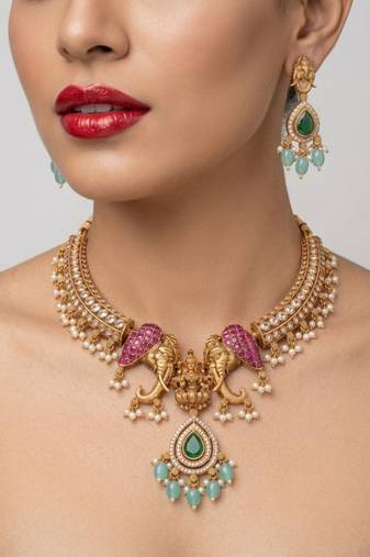 antique gold temple jewelry set with  elephant kundan & mint green beads