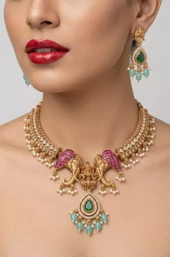 antique gold temple jewelry set with  elephant kundan & mint green beads