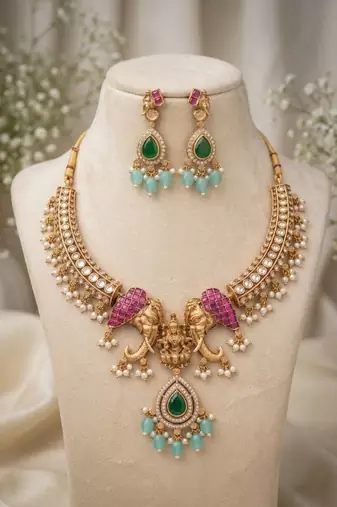 antique gold temple jewelry set with  elephant kundan & mint green beads