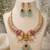antique gold temple jewelry set with  elephant kundan & mint green beads