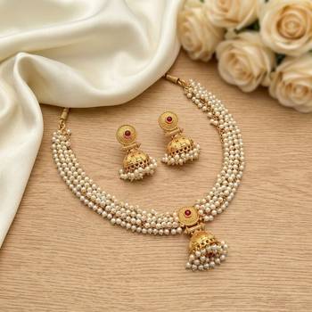 gold plated pearl choker necklace set with jhumka earrings  3