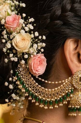 gold plated kundan & mirror work green  jhumka earrings with ear chain 
