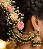 gold plated kundan & mirror work green  jhumka earrings with ear chain 