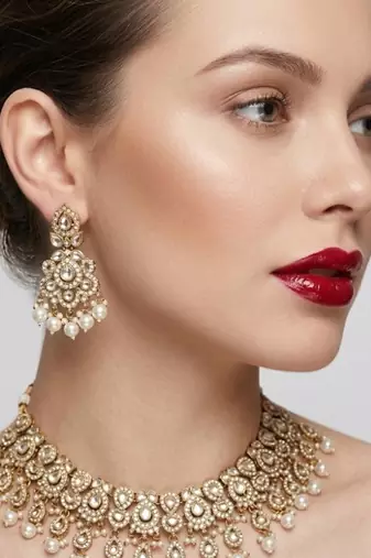 Gold plated kundan choker necklace set with pearl drops |