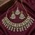 Gold plated kundan choker necklace set with pearl drops |