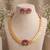 gold plated south indian temple coin necklace set with lotus meenakari pendant & earrings
