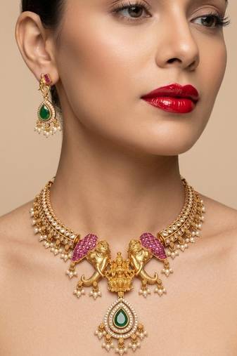 antique gold temple jewelry set with  elephant kundan & mint green beads