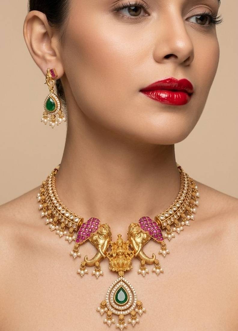 antique gold temple jewelry set with  elephant kundan & mint green beads