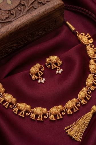 gold temple elephant necklace set with matching stud earrings