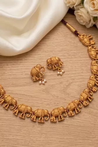 gold temple elephant necklace set with matching stud earrings