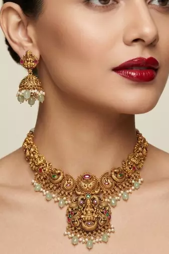 antique gold temple jewelry set: lakshmi necklace with jhumka earrings 